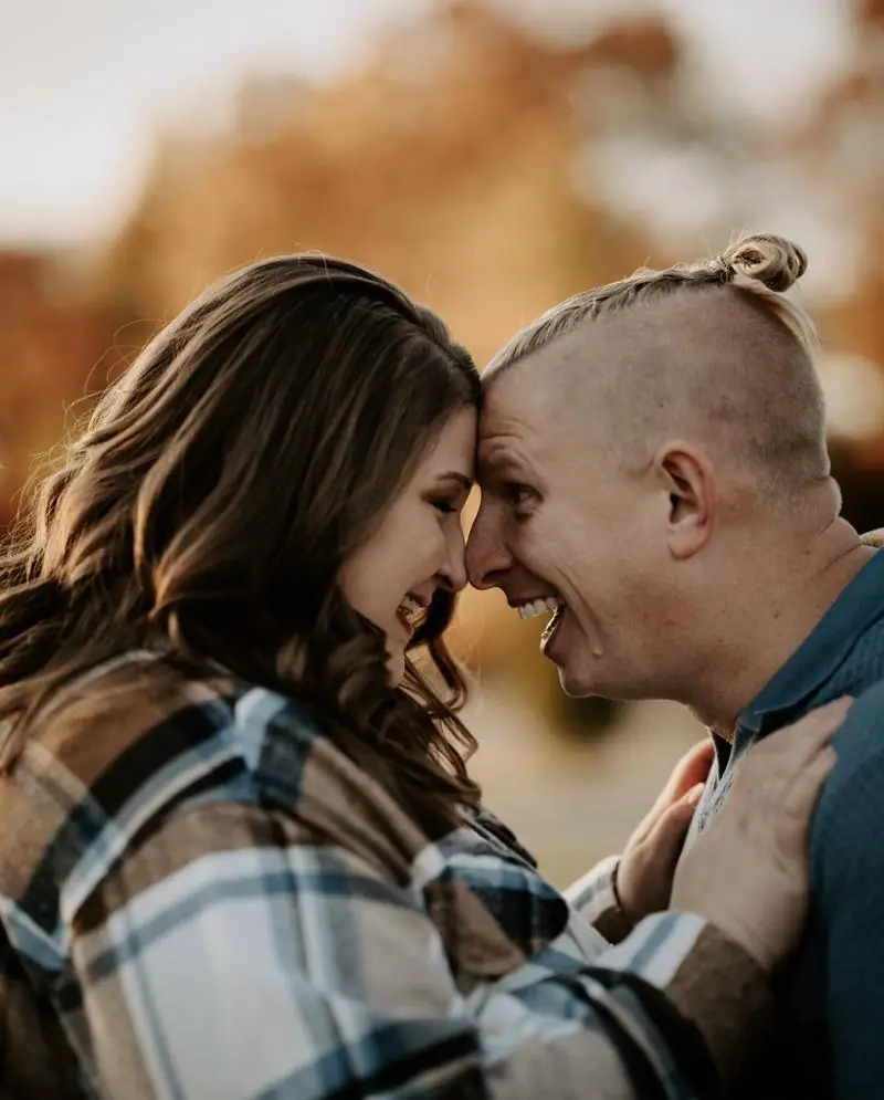 Couple laughing foreheads together Oklahoma couples session