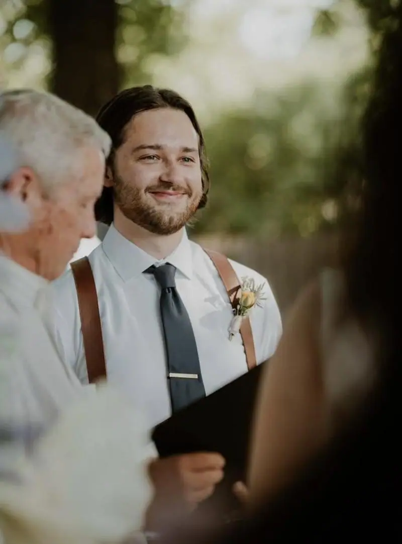 Groom smiling during outdoor ceremony wedding photographer Tulsa Oklahoma